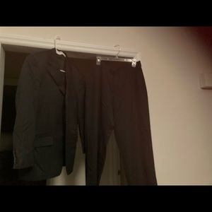 Black pinstriped suit